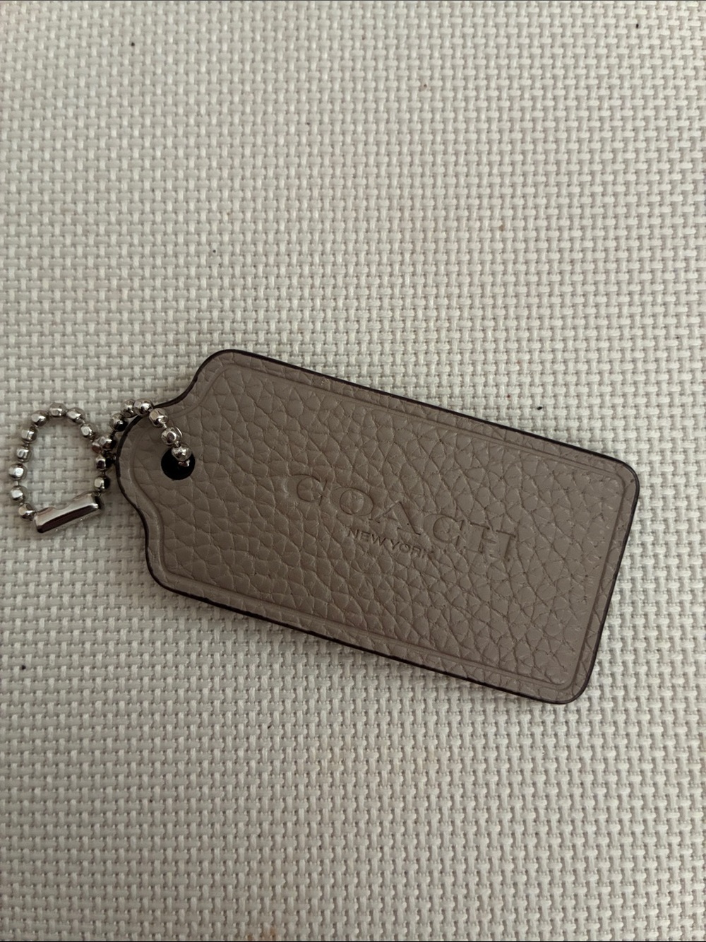 Coach Taupe Pebble Leather Hang Tag